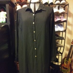 Shirt dress with high slit.